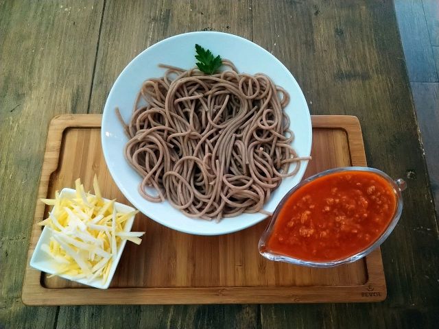 Spaghetti bolognese with cheese. Classics Takeaway food